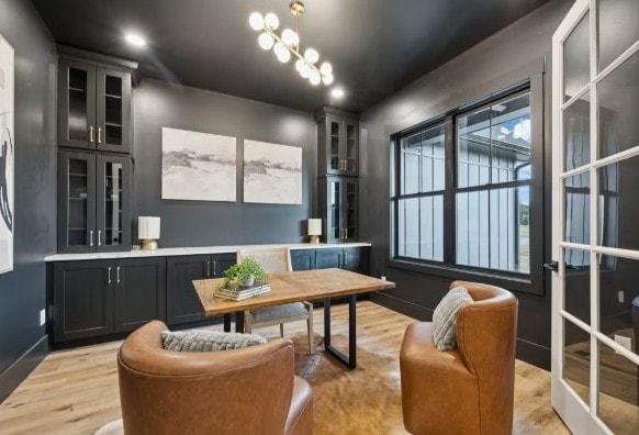 Dark Cyber Grey cabinetry in modern office/study with leather seating and warm accents