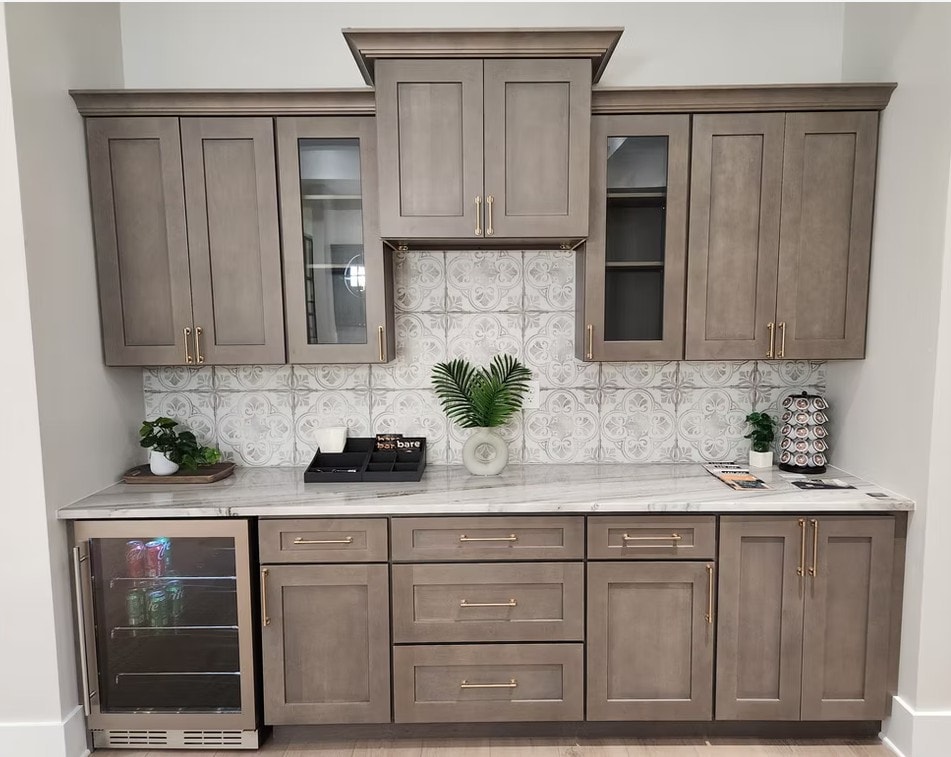 Driftwood full kitchen cabinetry with decorative tile and wine cooler