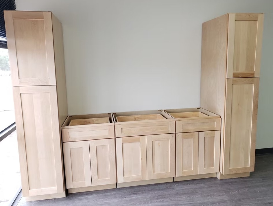 Versa Shaker cabinets on display showing towers and base cabinets uninstalled